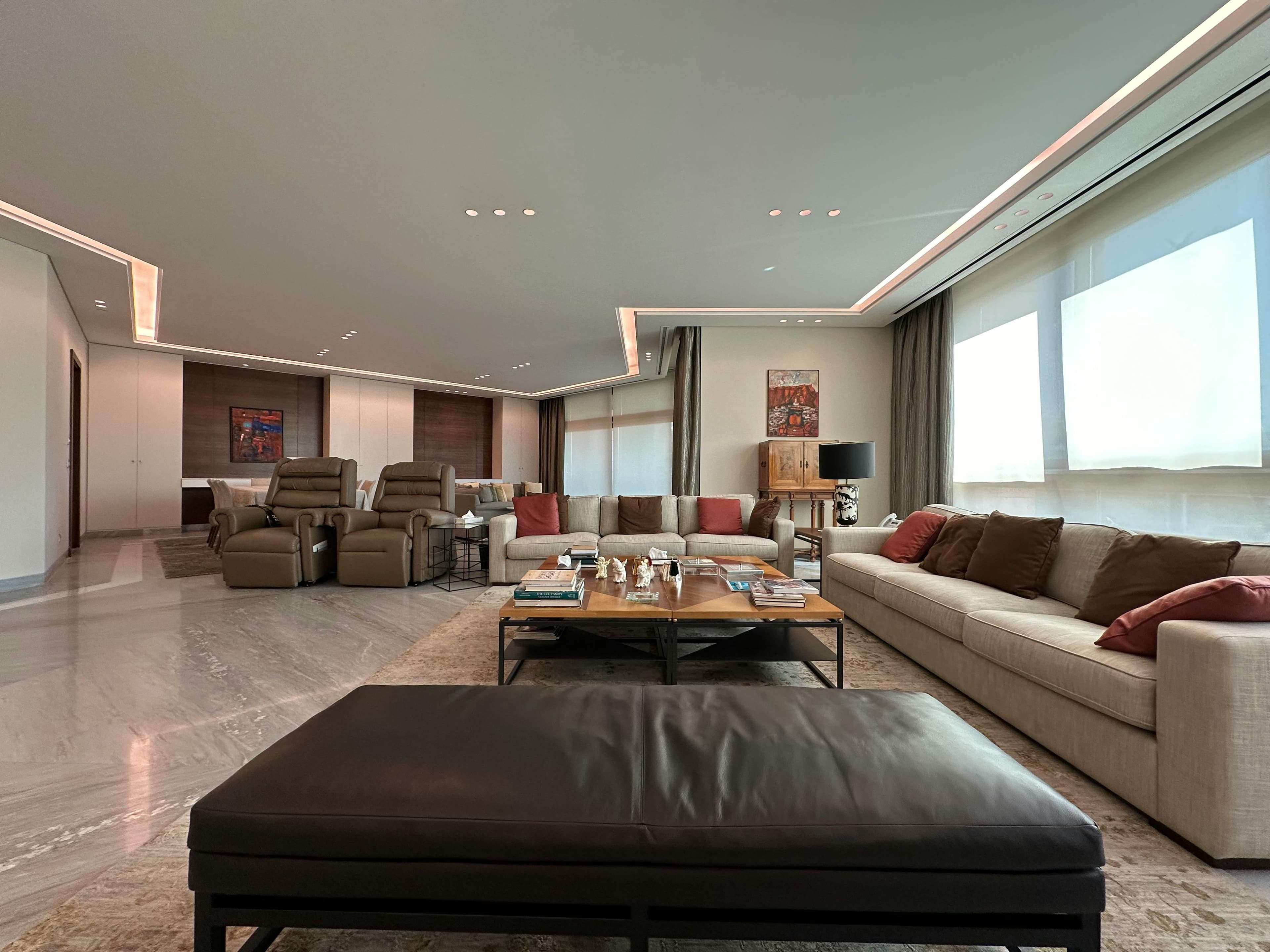 Limestone kitchen island with concealed lighting ribbon