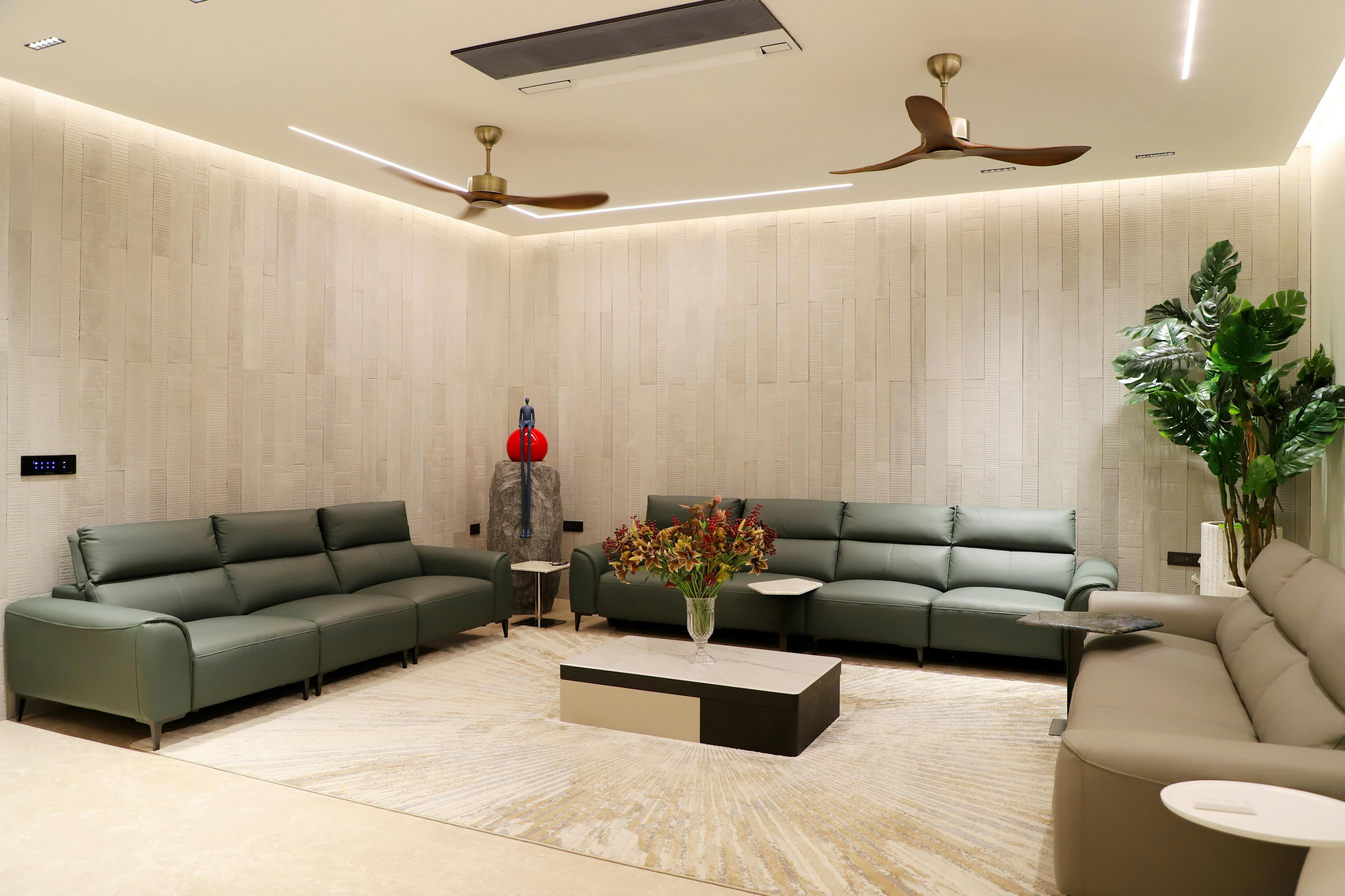 Dining room layered with bronze lighting and travertine
